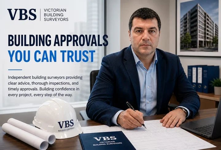 Victorian Building Surveyors hardhat and architectural plans on construction site